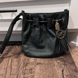 Michael Kors black cross body with tassel